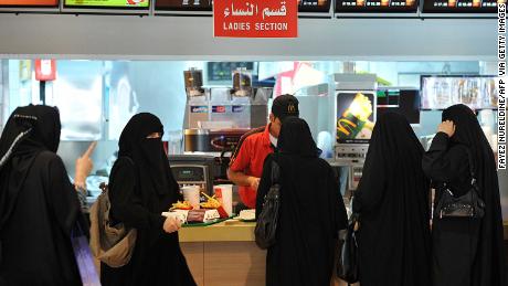 Saudi women wait in line in the &quot;Ladies Section&quot; of a McDonald&#39;s in Riyadh in September 2011.