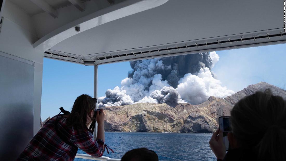 Michael Schade, a visitor to the island, captured this photo from a boat, moments after the eruption began.