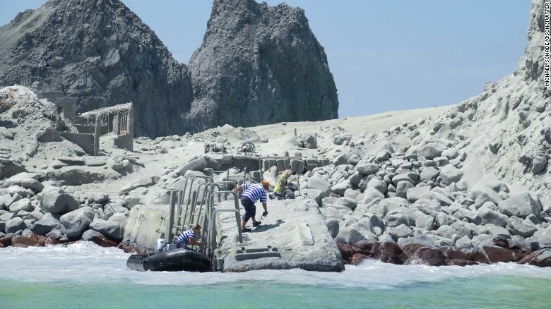 Tour operators prepare to evacuate visitors who were on the island during the eruption.