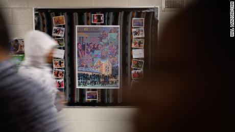 A bulletin board dedicated to Mario Aguilar hangs in the hallway at Wilbur Cross High School in New Haven, Connecticut. Since ICE detained Aguilar in September, students, teachers and administrators at the school have been pushing for his release.