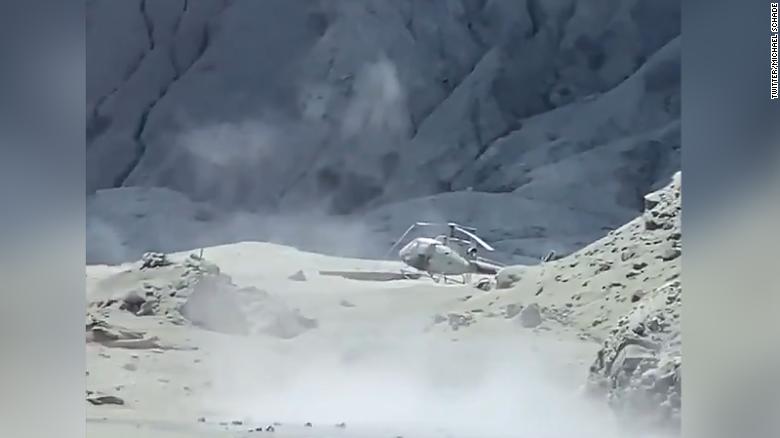 An image of a damaged helicopter on White Island after the eruption on Monday.