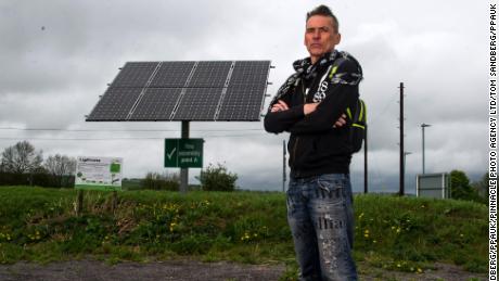Dale Vince, Chairman of Forest Green Rovers poses next to a solar panel at the New Lawn. The Stadium is completely fulled by renewable energy.