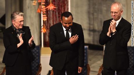 Ethiopian Prime Minister Abiy Ahmed, center, bows during the Nobel Peace Prize ceremony in Oslo, Norway, on Tuesday.