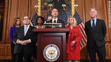 House Permanent Select Committee on Intelligence Chairman Adam Schiff (C) (D-CA), flanked by House Speaker Nancy Pelosi (L), House Judiciary Chairman Jerry Nadler (2nd L) (D-NY), House Foreign Affairs Committee Chairman Eliot Engel (R) (D-NY), House Financial Services Committee Chairwoman Maxine Waters (3rd L) (D-CA), House Committee on Oversight and Reform Chairwoman Carolyn Maloney (2nd R) (D-NY), speaks as Democrats announced articles of impeachment against US President Donald Trump during a press conference at the US Capitol in Washington, DC, December 10, 2019 listing abuse of power and obstruction of Congress. 