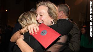 Employees at the real estate firm were shocked to find large bonuses in their surprise red envelopes. 