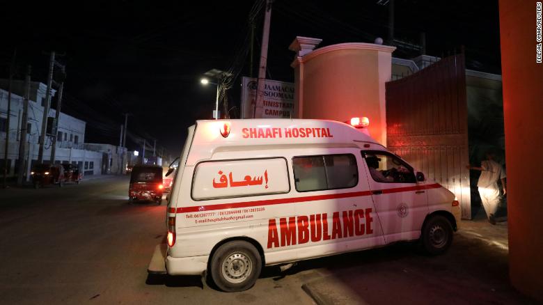 An ambulance carrying a victim from an attack by Al-Shabaab gunmen on a hotel near the presidential residence arrives at the Shaafi hospital in Mogadishu.