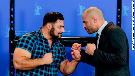 James Wilks (right) poses with German strongman Patrik Baboumian (left) who is a protagonist in &quot;The Game Changers&quot; and speaks of his improved performance since transitioning to a plant-based diet. 