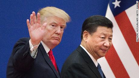 US President Donald Trump (L) and China&#39;s President Xi Jinping leave a business leaders event at the Great Hall of the People in Beijing on November 9, 2017.Donald Trump urged Chinese leader Xi Jinping to work &quot;hard&quot; and act fast to help resolve the North Korean nuclear crisis, during their meeting in Beijing on November 9, warning that &quot;time is quickly running out&quot;. / AFP PHOTO / Nicolas ASFOURI        (Photo credit should read NICOLAS ASFOURI/AFP via Getty Images)