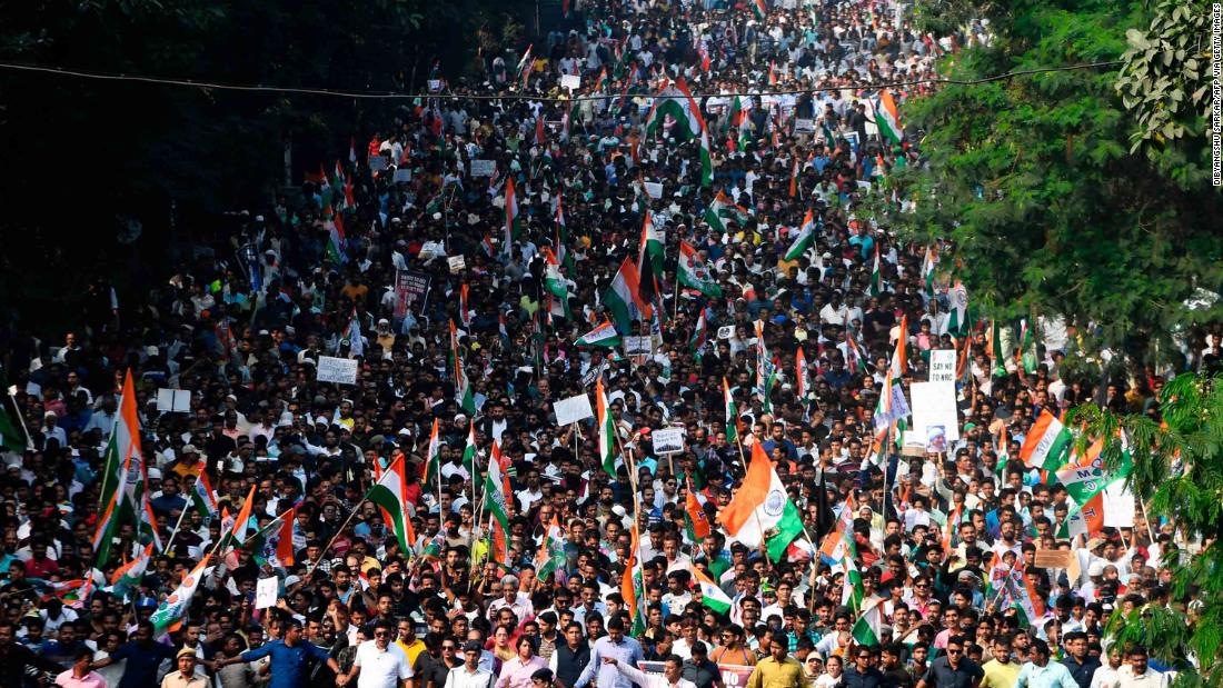 People participate in a mass rally in Kolkata, India, on December 16.