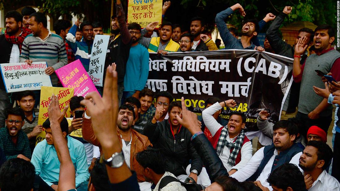 Students and activists protest outside the Allahabad University campus in Allahabad, India, on Monday, December 16.