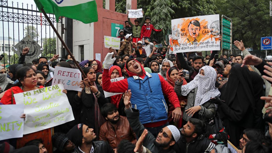 Students from Jamia Millia Islamia, a university in New Delhi, shout slogans during a protest on Tuesday, December 17.