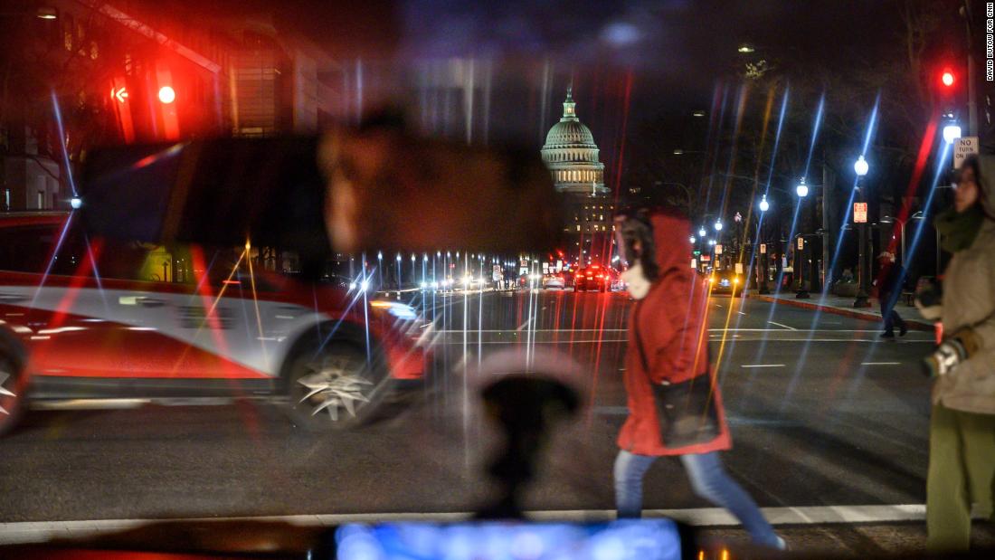 The US Capitol is seen from a crosswalk as the House of Representatives prepares to vote on impeachment.