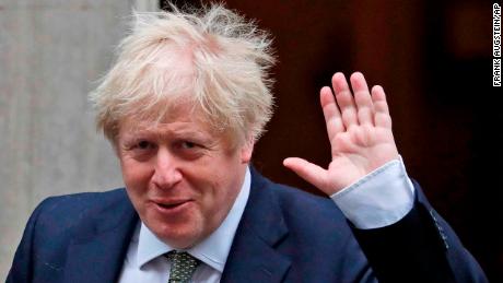 Britain&#39;s Prime Minister Boris Johnson waves as he leaves Downing Street for the State Opening of Parliament by Queen Elizabeth II, in the House of Lords at the Palace of Westminster in London, Thursday, Dec. 19, 2019.(AP Photo/Frank Augstein)
