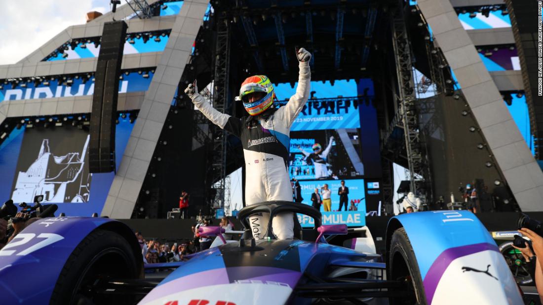 BMW&#39;s Sims celebrates following his maiden Formula E victory.