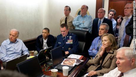 President Barack Obama, Vice President Joe Biden, Secretary of State Hillary Clinton and members of the national security team receive an update on the mission against Osama bin Laden in the Situation Room of the White House May 1, 2011 in Washington, DC.