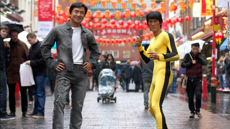 Jackie Chan, left, and Bruce Lee wax figures are pictured during a photo call in the heart of London&#39;s Chinatown on January 29, 2014, ahead of Lunar New Year celebrations. 