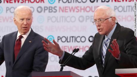 LOS ANGELES, CALIFORNIA - DECEMBER 19: Sen. Bernie Sanders (I-VT) (R) speaks as former Vice President Joe Biden listens during the Democratic presidential primary debate at Loyola Marymount University on December 19, 2019 in Los Angeles, California. Seven candidates out of the crowded field qualified for the 6th and last Democratic presidential primary debate of 2019 hosted by PBS NewsHour and Politico. (Photo by Justin Sullivan/Getty Images)