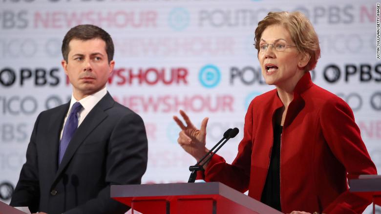 LOS ANGELES, CALIFORNIA - DECEMBER 19: Sen. Elizabeth Warren (D-MA) speaks as South Bend, Indiana Mayor Pete Buttigieg listens during the Democratic presidential primary debate at Loyola Marymount University on December 19, 2019 in Los Angeles, California. Seven candidates out of the crowded field qualified for the 6th and last Democratic presidential primary debate of 2019 hosted by PBS NewsHour and Politico. (Photo by Justin Sullivan/Getty Images)