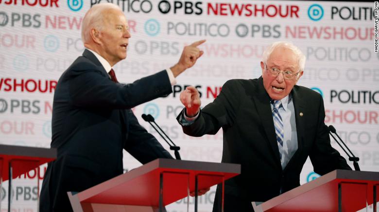Joe Biden and Bernie Sanders argue about healthcare and the affordable care act during the Democratic debate co-hosted by Politico and PBS Newshour in Los Angeles, California, on Thursday, December 19.