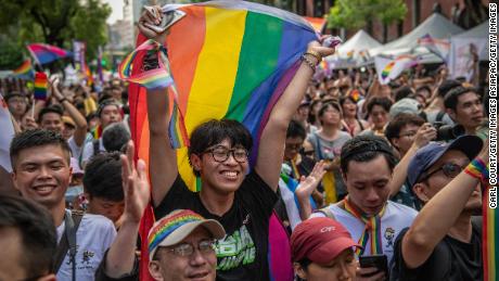 People celebrate after Taiwan&#39;s Parliament voted to legalize same-sex marriage on May 17, 2019 in Taipei.