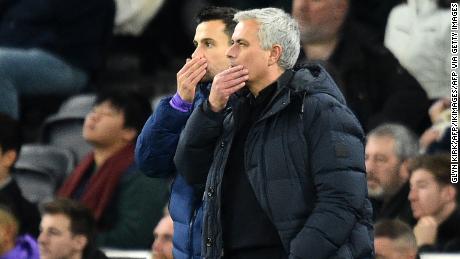 Tottenham Hotspur&#39;s Portuguese head coach Jose Mourinho (R) and Tottenham Hotspur&#39;s assistant head coach Joao Sacramento (L) react on the touchline during the English Premier League football match between Tottenham Hotspur and Chelsea at Tottenham Hotspur Stadium in London, on December 22, 2019. (Photo by Glyn KIRK / IKIMAGES / AFP) / RESTRICTED TO EDITORIAL USE. No use with unauthorized audio, video, data, fixture lists, club/league logos or &#39;live&#39; services. Online in-match use limited to 45 images, no video emulation. No use in betting, games or single club/league/player publications. (Photo by GLYN KIRK/IKIMAGES/AFP via Getty Images)