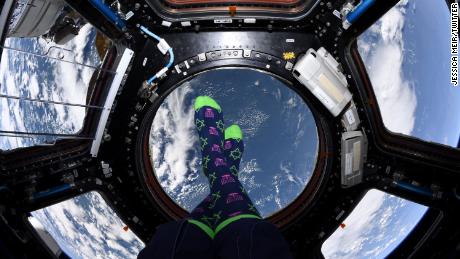 Astronaut Jessica Meir shows off her Hanukkah socks from the International Space Station. 