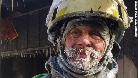 Assistant Chief Bimbo Gifford after battling a fire in freezing temperatures.