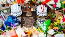 Tributes for volunteer firemen Andrew O'Dwyer and Geoffrey Keaton at Horsley Park Rural Fire Brigade in Sydney, Australia, on Sunday, December 22. It's believed their vehicle hit a tree before rolling off the road, the New South Wales Rural Fire Service said in a statement.