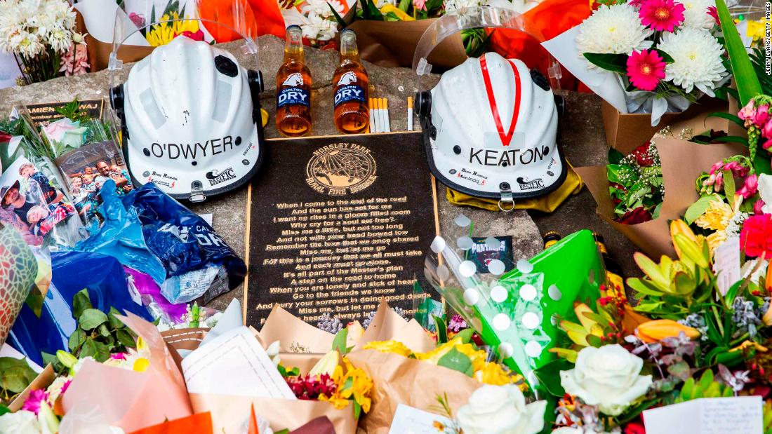 Tributes for volunteer firemen Andrew O&#39;Dwyer and Geoffrey Keaton are seen at Horsley Park Rural Fire Brigade in Sydney, Australia, on December 22. It&#39;s believed they were killed when their vehicle hit a tree before rolling off the road, the &lt;a href=&quot;https://edition.cnn.com/2019/12/20/australia/australia-firefighter-death-intl-hnk-scli/index.html&quot; target=&quot;_blank&quot;&gt;New South Wales Rural Fire Service said in a statement&lt;/a&gt;.
