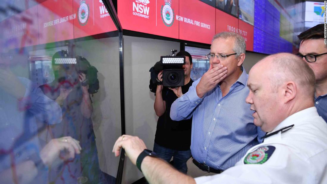 Australian Prime Minister Scott Morrison is briefed by fire officials at New South Wales Rural Fire Service control room in Sydney on December 22. Morrison arrived back in Sydney &lt;a href=&quot;https://edition.cnn.com/2019/12/22/asia/australia-fire-prime-minister-criticism-apology/index.html&quot; target=&quot;_blank&quot;&gt;amid criticism after taking a family holiday to Hawaii during the bushfire emergency.&lt;/a&gt;