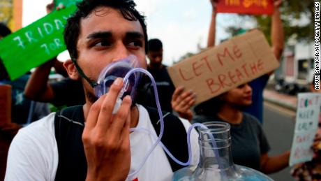 Students take part in a demonstration calling for action against climate change, in Chennai on November 29, 2019. 