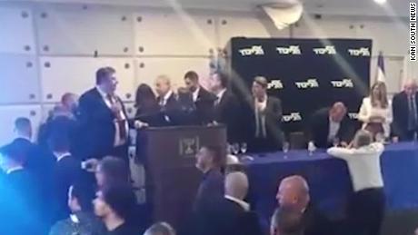 Benjamin Netanyahu rushed offstage as rocket fired from Gaza into Israel