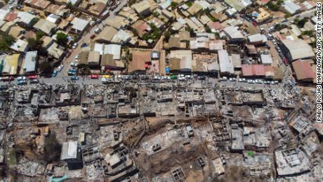 Aerial view of burnt houses after a forest fire in Valparaiso, Chile.