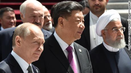 Russian President Vladimir Putin, Chinese President Xi Jinping and Iran&#39;s President Hassan Rouhani attend a meeting of the Shanghai Cooperation Organisation (SCO) Council of Heads of State in Bishkek on June 14.