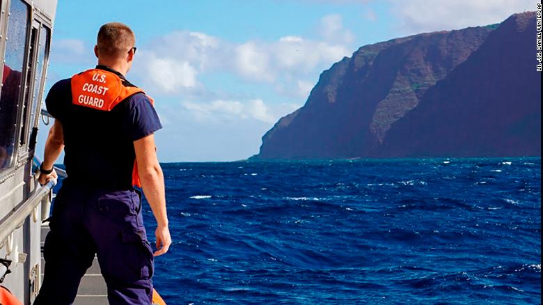 In this photo released by the U.S. Coast Guard, Coast Guard Cutter William Hart moves toward the Na Pali Coast on the Hawaiian island of Kauai on Friday.