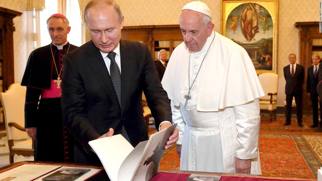 Pope Francis exchanges gifts with Putin as Putin visited Vatican City in July 2019.