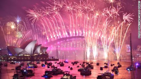 Fireworks erupt over Sydney&#39;s Harbour Bridge and Opera House during the fireworks show on January 1, 2019. 