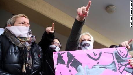 Protesters stage a demonstration outside a court house in Paralimni, Cyprus on Monday, December 30, 2019, in support of a 19 year-old British woman who was found guilty of fabricating claims that she was gang raped by 12 Israelis. Announcing his verdict, Judge Michalis Papathanasiou said the defendant didn&#39;t tell the truth and tried to deceive the court with &quot;convenient&quot;and &quot;evasive&quot; statements in court. She is due to be sentenced on Jan. 7.(AP Photo/Philippos Christou)
