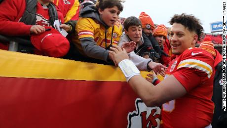 Quarterback Patrick Mahomes celebrates with fans after the Chiefs defeated the Los Angeles Chargers.