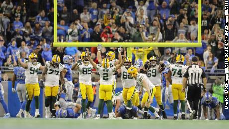 Mason Crosby celebrates his game-winning field goal against the Detroit Lions.