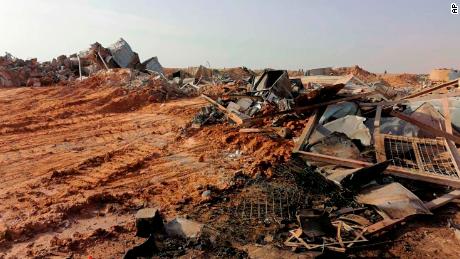 The headquarters of Kataib Hezbollah lies in ruins in the aftermath of a US airstrike in Qaim, Iraq.