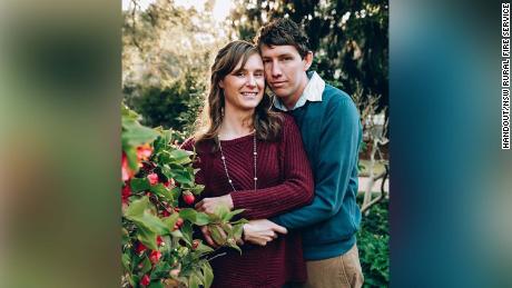 Volunteer firefighter Samuel McPaul pictured with his wife. 