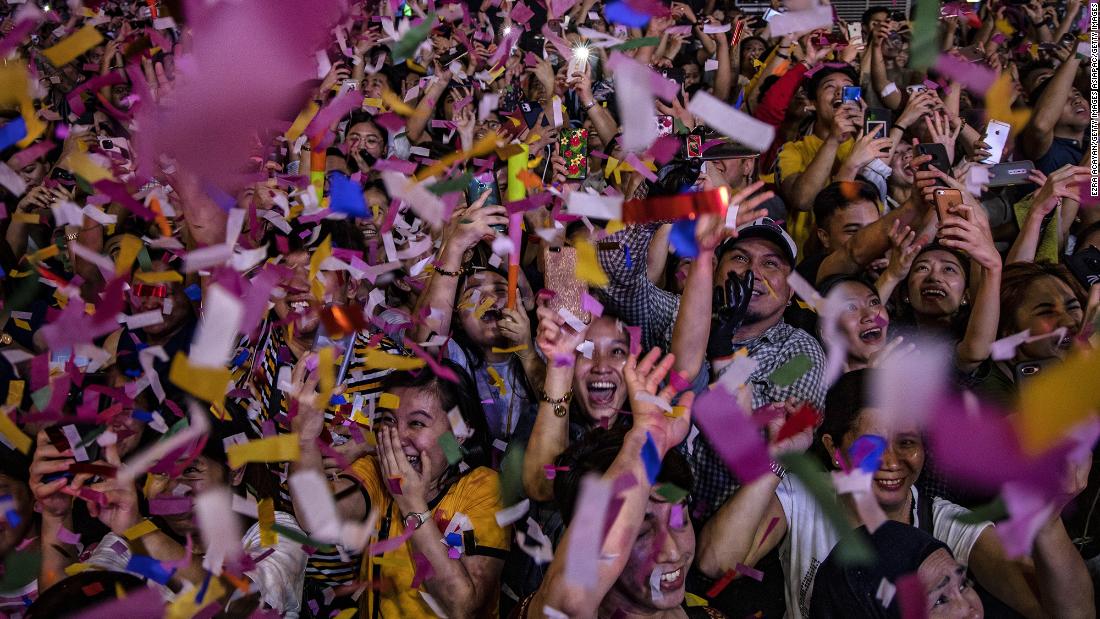 Revelers ring in the new year at a mall in Manila, Philippines.