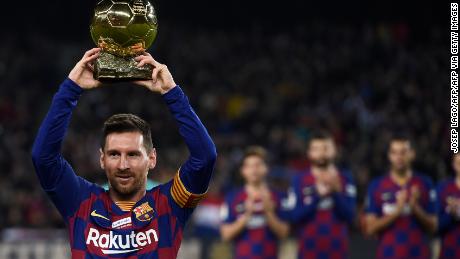 Lionel Messi poses with his sixth Ballon d&#39;Or before a La Liga game for Barcelona earlier this month. 