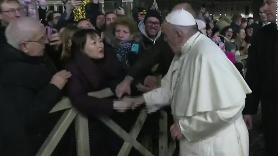 Pope Francis smacks woman's hand to free himself from her grip - CNN