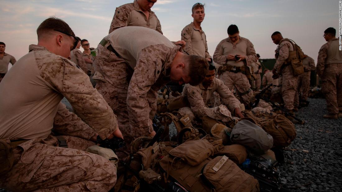 US Marines from a crisis response task force based in Kuwait prepare to deploy to Baghdad to bolster security at the embassy. 