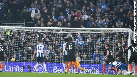  Alireza Jahanbakhsh (second right) is on his knees as his spectacular bicycle kick heads for the Chelsea goal. 