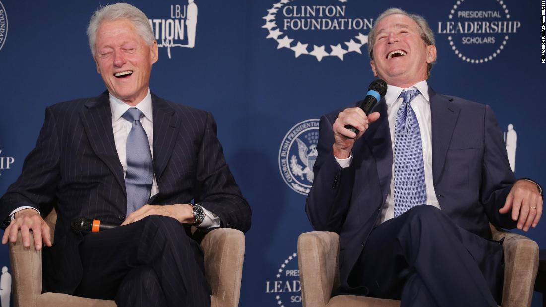 Clinton and former President George W. Bush share a laugh during a September 2014 event launching the Presidential Leadership Scholars program at the Newseum in Washington, DC.