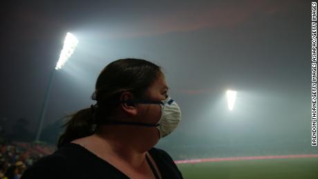 A fan wears a face mask during a Big Bash League cricket match in Canberra last month. 