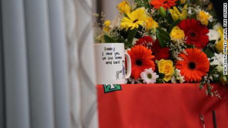 A mug placed on the coffin was inscribed with the words: &quot;Daddy I love you to the moon and back!&quot;
